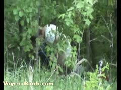 Adorable young white In the jungle, a married slut wearing a white t-shirt urinates.
